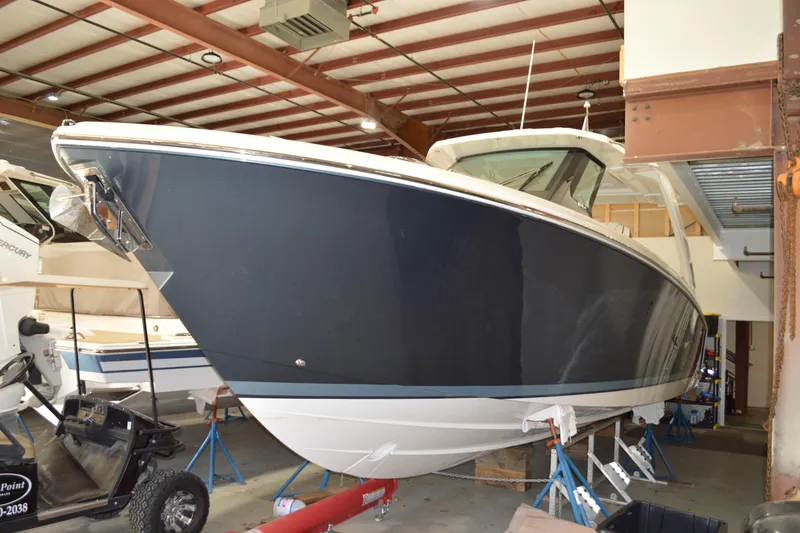 The Image of 2024 Tiara Yachts 34 LS in storage, showcasing sleek design and modern features. - 0