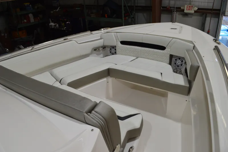 Slide: The Image of 2024 Tiara Yachts 34 LS interior with luxurious seating and modern design. - 12