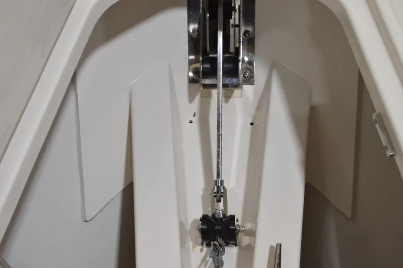 Slide: The Image of 2024 Tiara Yachts 34 LS anchor locker with chain and winch mechanism. - 13