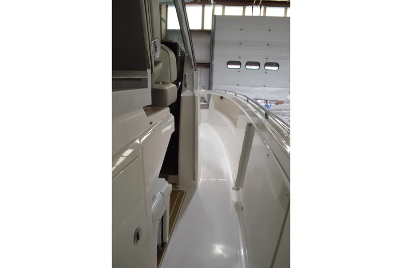 Slide: The Image of 2024 Tiara Yachts 34 LS interior view, showcasing sleek design and craftsmanship. - 24