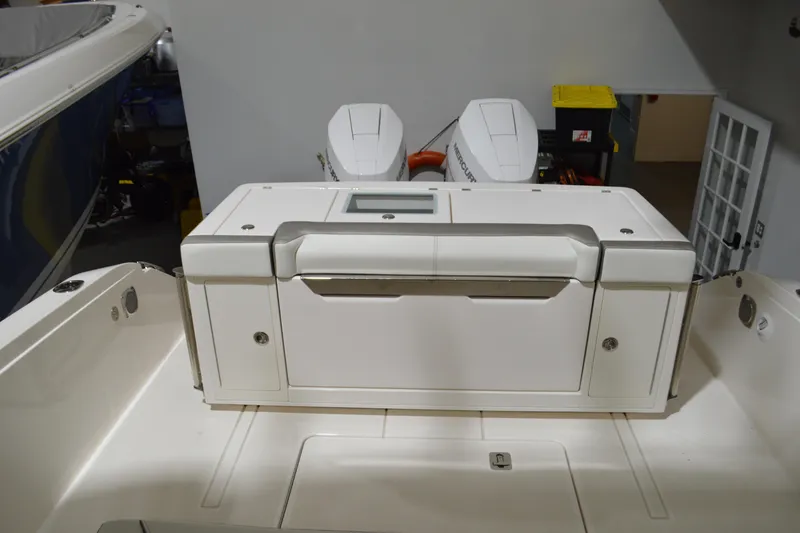 Slide: The Image of 2024 Tiara Yachts 34 LS boat interior with dual outboard engines. - 32
