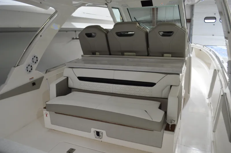 Slide: The Image of 2024 Tiara Yachts 34 LS interior with luxurious seating and modern design. - 47