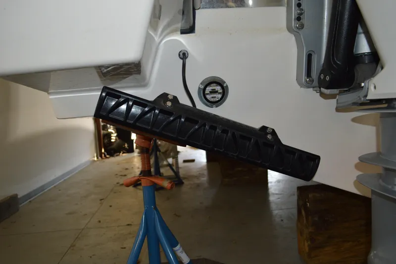 Slide: The Image of 2024 Tiara Yachts 34 LS boat detail in a garage setting. - 5
