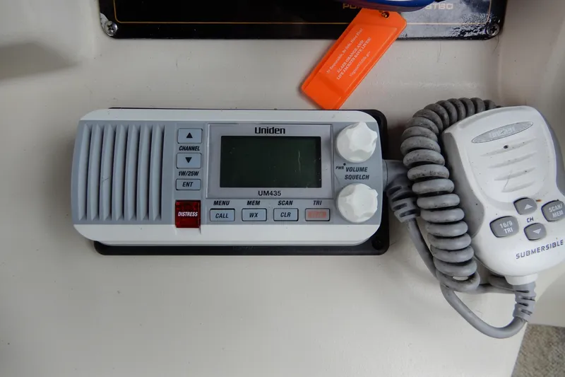 Slide: The Image of Uniden UM435 marine radio on 1999 Cruisers Yachts 3075 Rogue dashboard. - 19