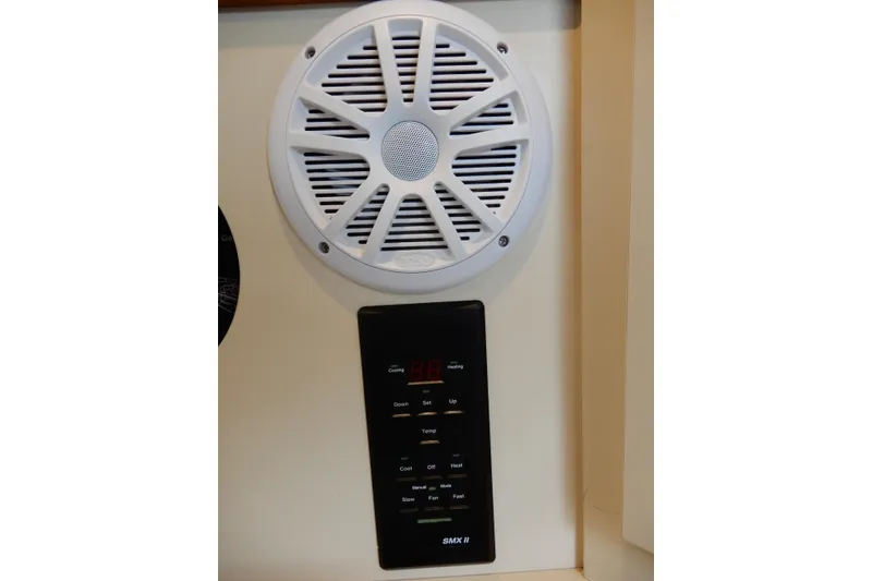 Slide: The Image of 1999 Cruisers Yachts 3075 Rogue speaker and control panel detail. - 43