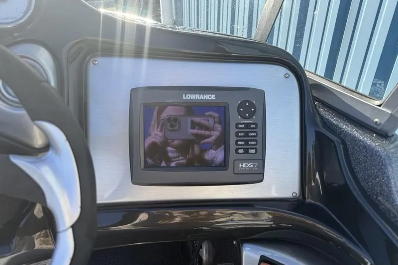 Slide: The Image of Dashboard of a 2014 Stratos 386 XF with Lowrance HDS-7 display. - 14