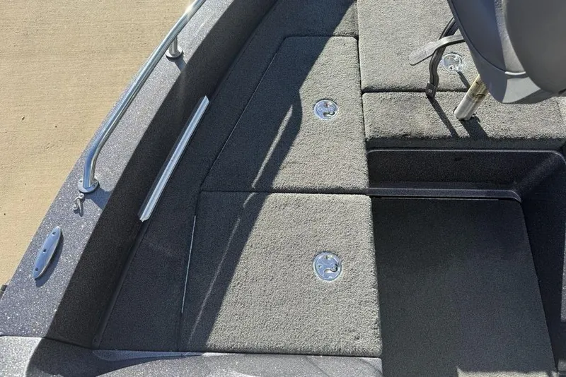 Slide: The Image of 2014 Stratos 386 XF boat deck with storage compartments and metal fixtures. - 4