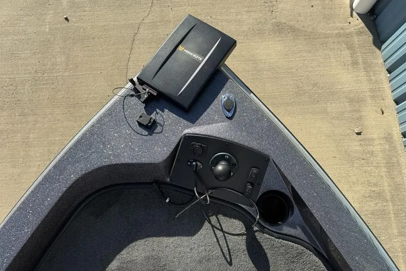 Slide: The Image of Bow of a 2014 Stratos 386 XF boat with control panel and Minn Kota device. - 5