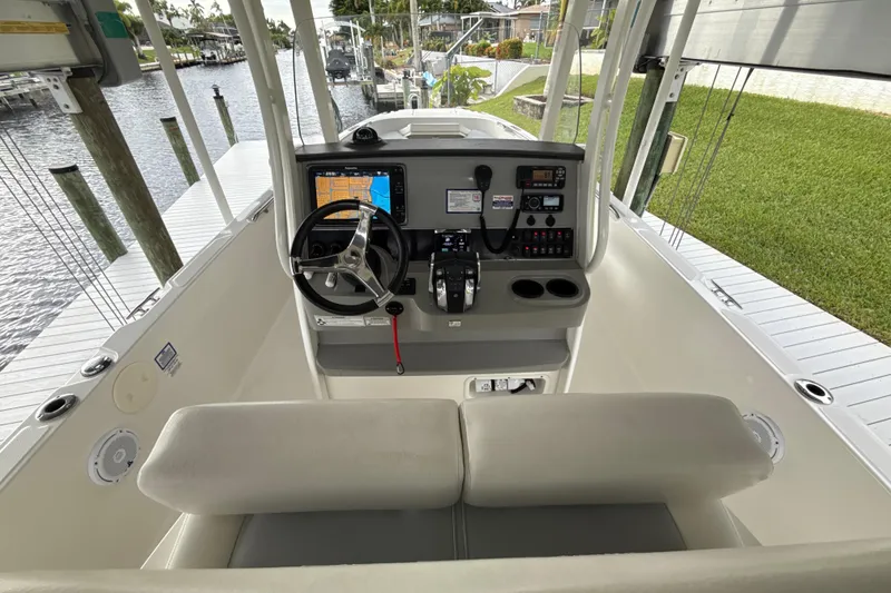 Slide: The Image of 2015 Boston Whaler 270 Dauntless helm with navigation system and controls. - 5