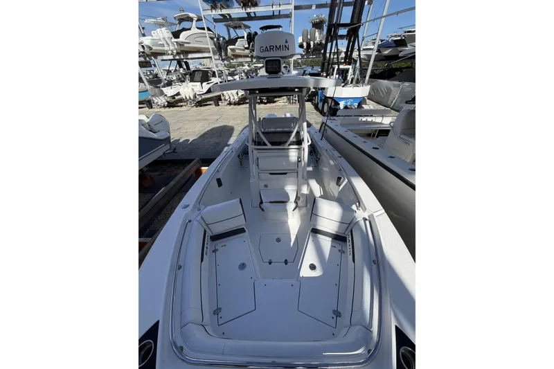 Slide: The Image of 2021 Blackfin 252 CC boat with Garmin equipment in a marina storage. - 16