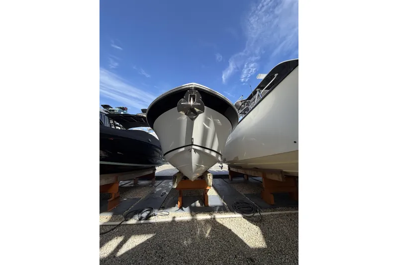 Slide: The Image of 2021 Blackfin 252 CC boat on dry dock, registration FL 3986 SZ. - 4