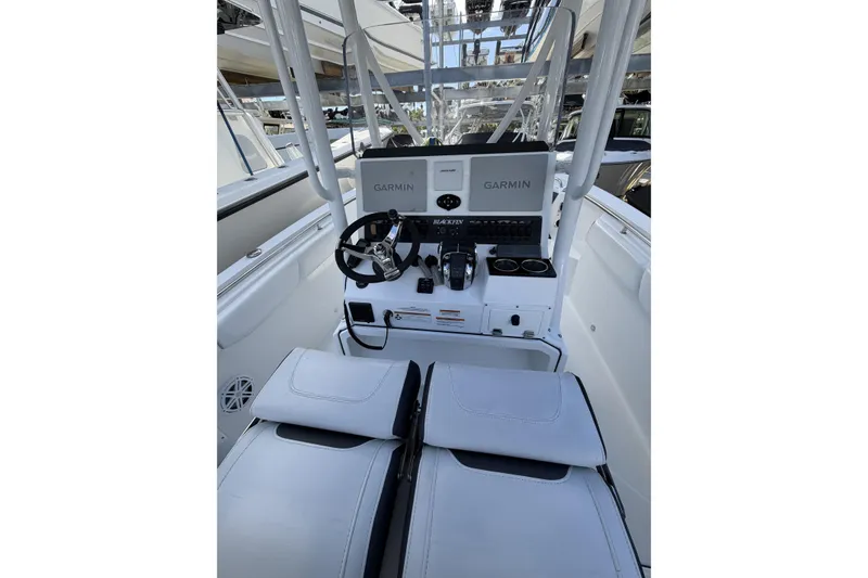 Slide: The Image of 2021 Blackfin 252 CC boat interior with seating and storage compartments. - 6