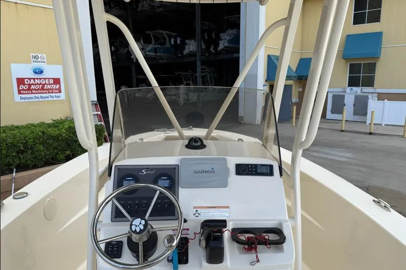 Slide: The Image of 2017 Scout 195 Sportfish boat dashboard with Garmin navigation system. - 7