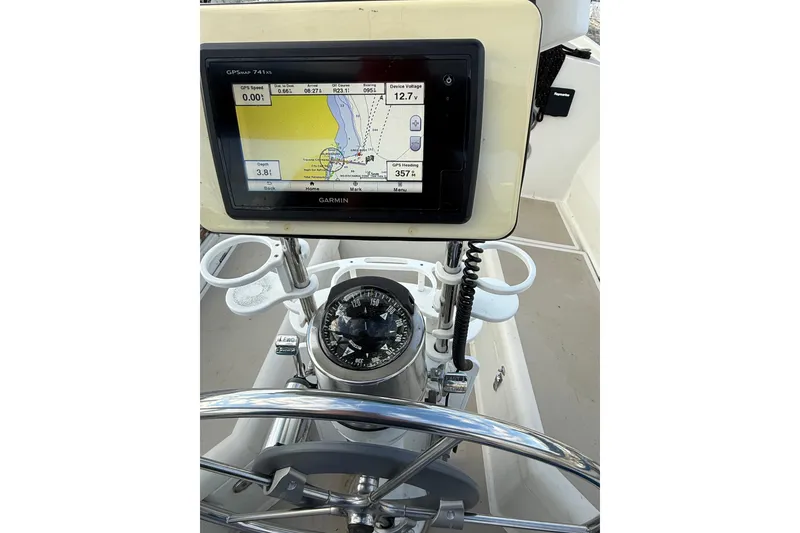 Slide: The Image of Cockpit of 1983 O'Day 34 sailboat with Garmin GPS and compass. - 11