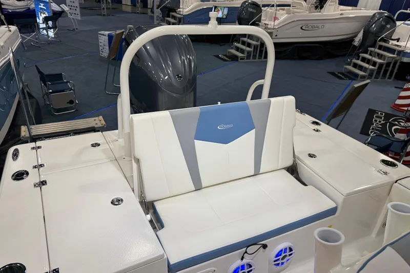 Slide: The Image of Manufacturer Provided Image: 2025 Robalo 226 Cayman boat cockpit with modern controls and steering wheel. - 22