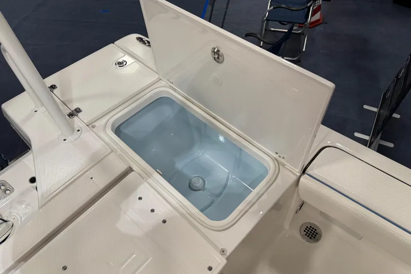 Slide: The Image of Manufacturer Provided Image: 2025 Robalo 226 Cayman boat interior with sleek seating and console design. - 23