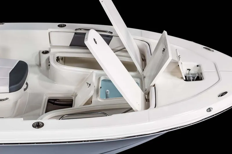 Slide: The Image of Open storage compartment on 2026 Robalo 226 Cayman boat, showcasing interior design. - 8