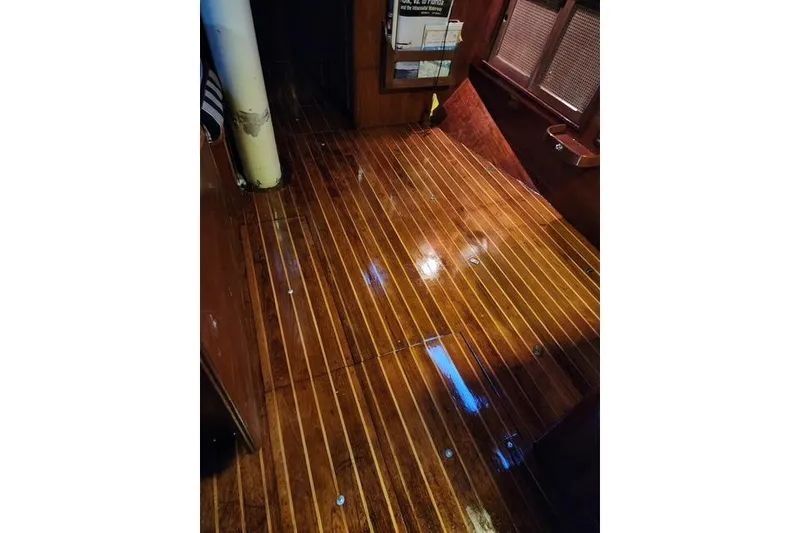 Slide: The Image of Polished wooden interior of 1984 Bristol 45.5 Center Cockpit sailboat. - 31