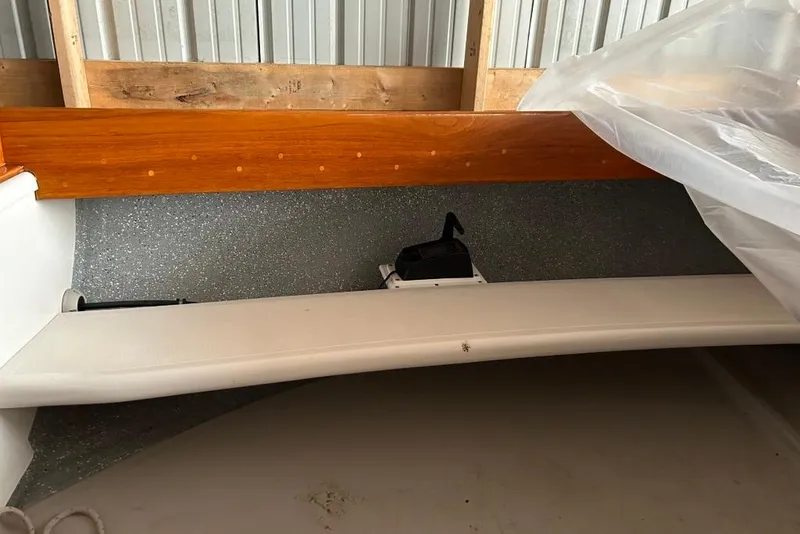 Slide: The Image of 2004 Cape Cod Shipbuilding Bull's Eye boat interior with wooden and white seating. - 10