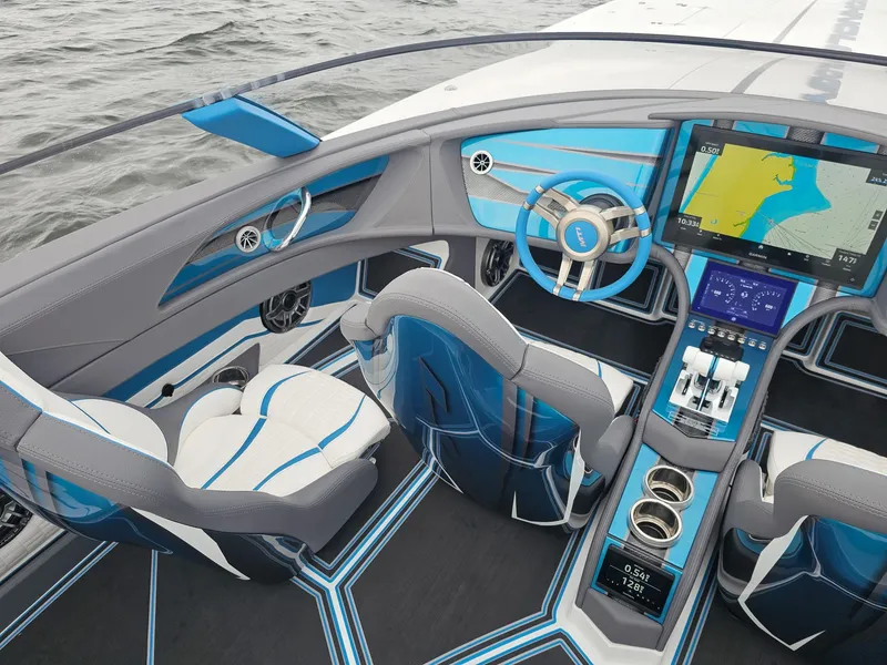 Slide: The Image of 2026 MTI 440X boat interior with modern dashboard, blue accents, and advanced navigation system. - 16