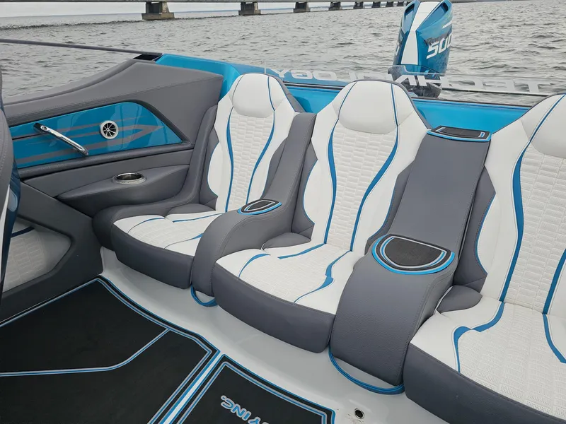 Slide: The Image of Luxury seating in 2026 MTI 440X boat, featuring sleek design and blue accents. - 36