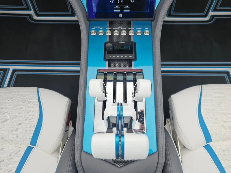 Slide: The Image of Center console of 2026 MTI 440X boat with modern controls and blue accents. - 41