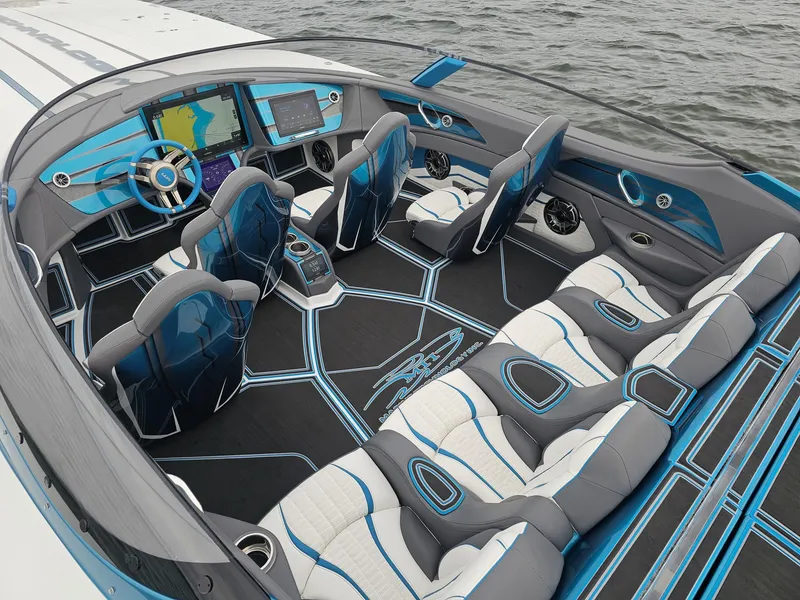 Slide: The Image of 2026 MTI 440X boat interior with modern seating and advanced navigation systems. - 9