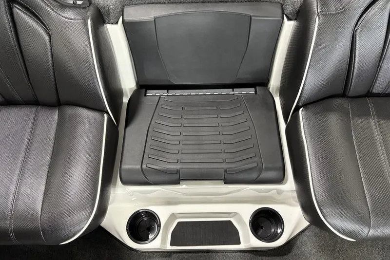 Slide: The Image of 2025 Skeeter ZXR20 boat interior with black seats and center console. - 19