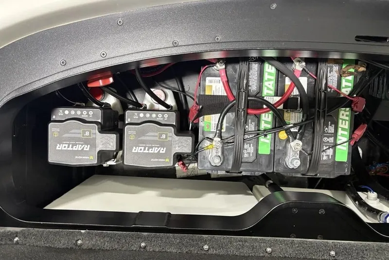 Slide: The Image of Battery compartment of 2025 Skeeter ZXR20 boat with Interstate batteries and wiring. - 30