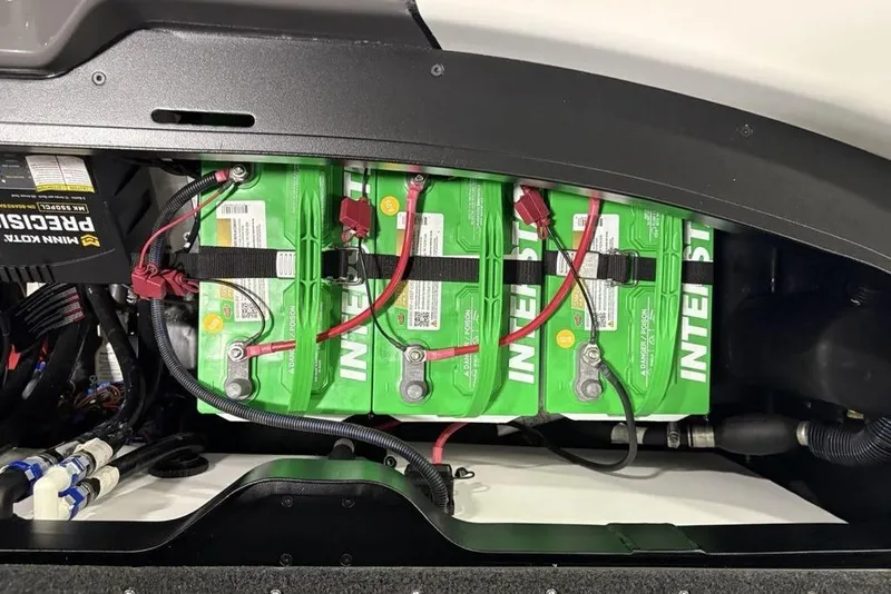 Slide: The Image of Battery compartment of 2025 Skeeter ZXR20 with Interstate batteries and wiring. - 32
