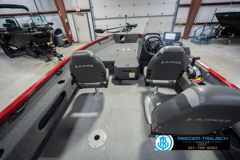 Slide: The Image of 2020 Lund 1775 Adventure SS boat interior with dual seats and steering console. - 14