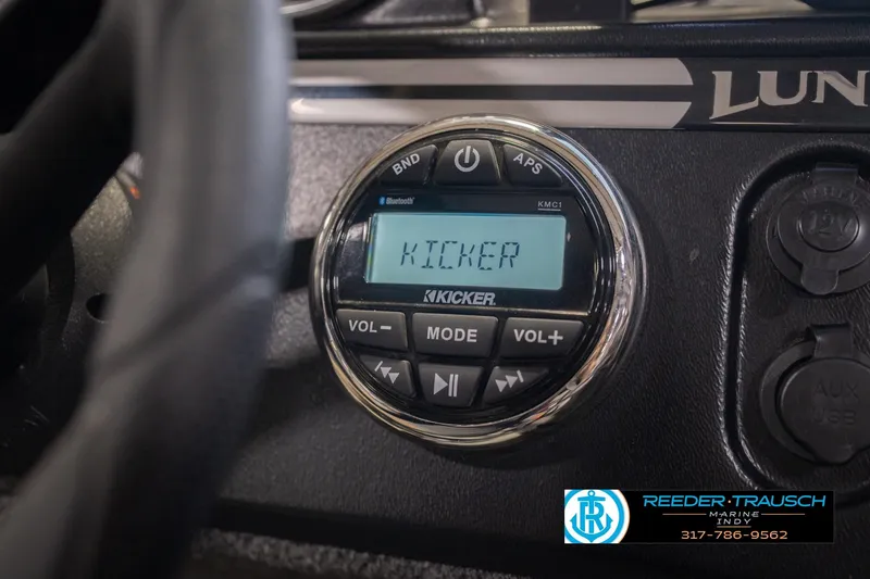 Slide: The Image of 2020 Lund 1775 Adventure SS dashboard with Kicker audio system and controls. - 32