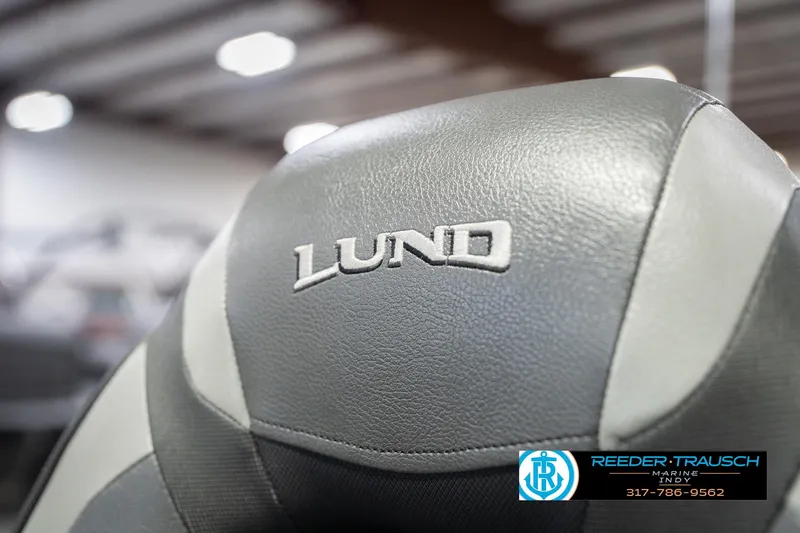 Slide: The Image of Close-up of 2020 Lund 1775 Adventure SS boat seat with logo in showroom. - 37