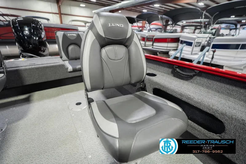 Slide: The Image of 2020 Lund 1775 Adventure SS boat interior with gray seating in showroom. - 38