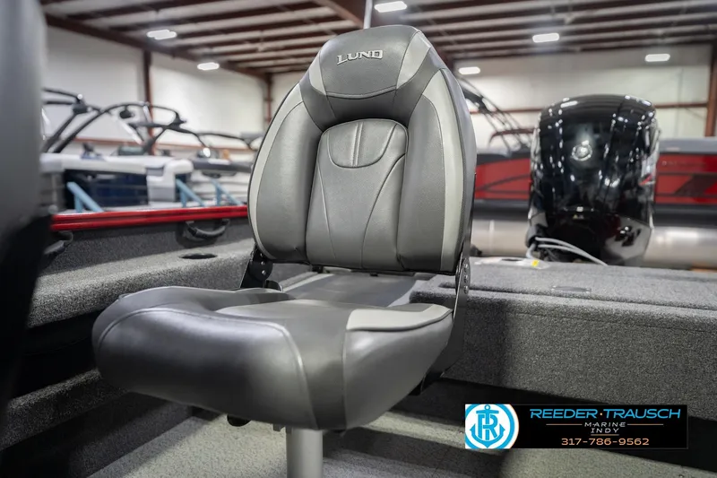 Slide: The Image of 2020 Lund 1775 Adventure SS boat seat in showroom, featuring sleek design and comfortable upholstery. - 39
