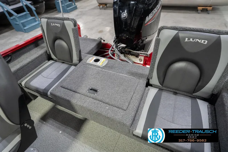 Slide: The Image of 2020 Lund 1775 Adventure SS boat interior with gray seating and Mercury engine. - 40