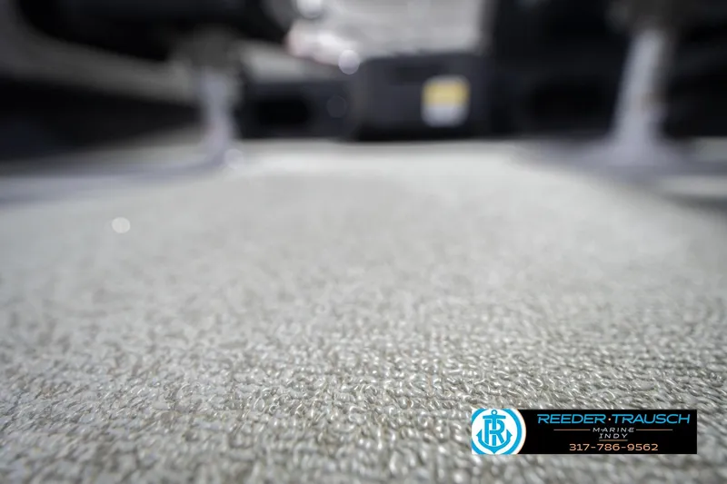 Slide: The Image of 2020 Lund 1775 Adventure SS boat interior flooring, Reeder Trausch Marine logo visible. - 43