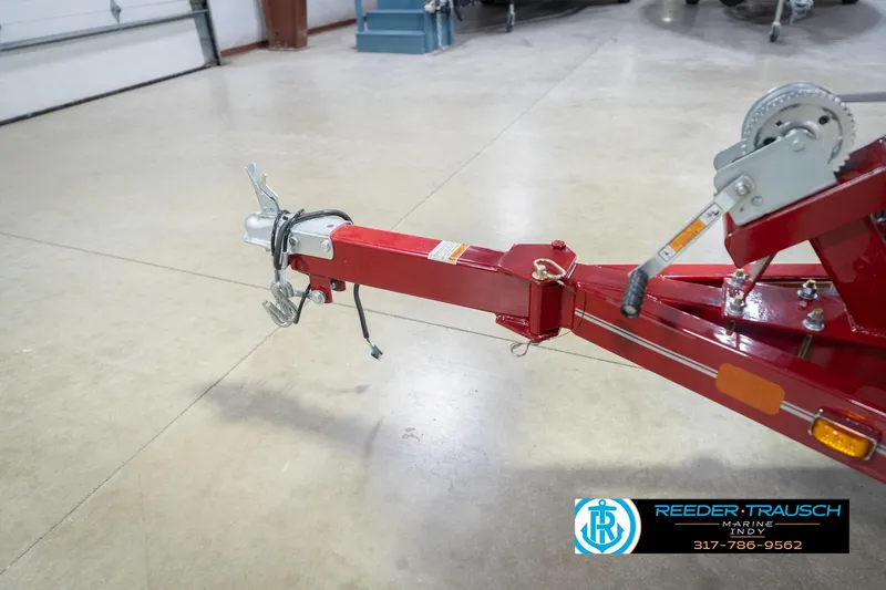 Slide: The Image of Red trailer hitch of 2020 Lund 1775 Adventure SS in a garage setting. - 55