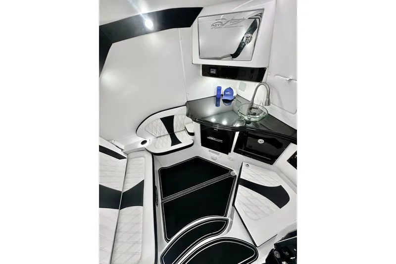 Slide: The Image of 2024 MTI V42 luxury boat interior with city skyline and waterfront view. - 14