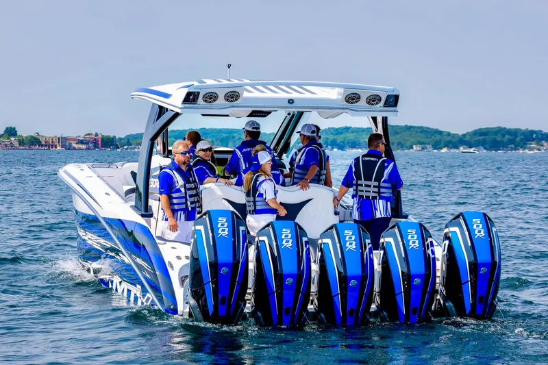 Slide: The Image of Luxurious 2024 MTI V42 boat interior with plush seating and waterfront view. - 16