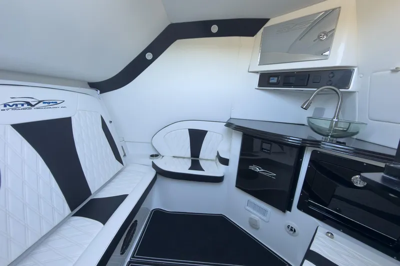 Slide: The Image of Luxurious interior of 2024 MTI V42 boat with sleek seating and modern amenities. - 21