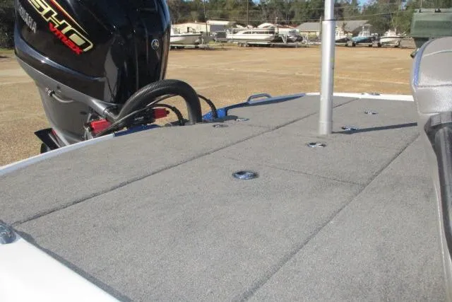 Slide: The Image of 2024 Skeeter ZXR19 boat deck with Yamaha VMAX engine in a marina setting. - 3