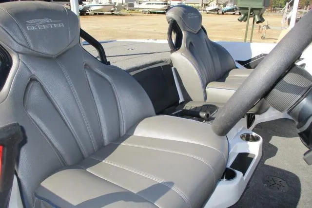 Slide: The Image of 2024 Skeeter ZXR19 boat interior with sleek gray seats and modern design. - 4