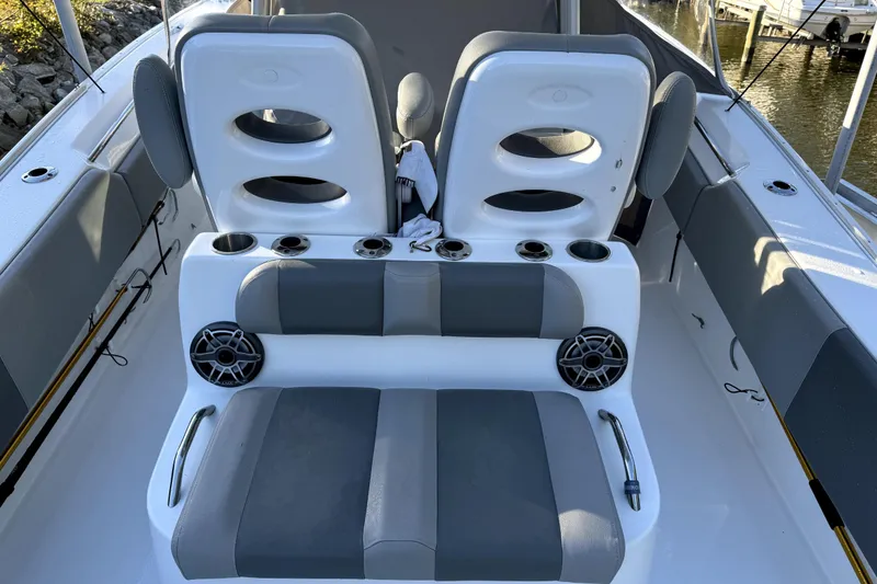 Slide: The Image of 2021 Cape Horn 32 XS boat interior with dual seats and cup holders. - 5