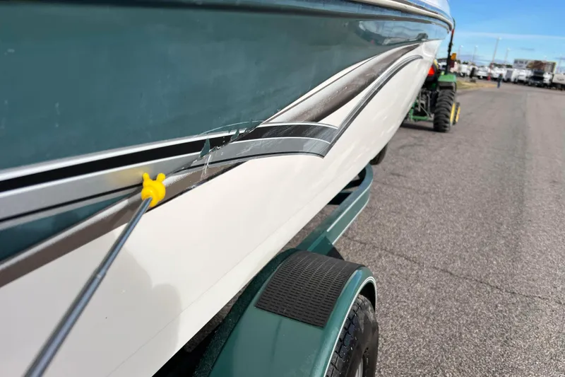 Slide: The Image of 2006 Hurricane FunDeck GS 194 OB boat on trailer, close-up view. - 11