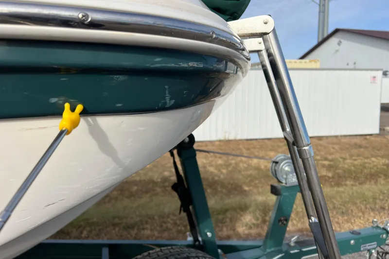 Slide: The Image of 2006 Hurricane FunDeck GS 194 OB boat on trailer, close-up view. - 13