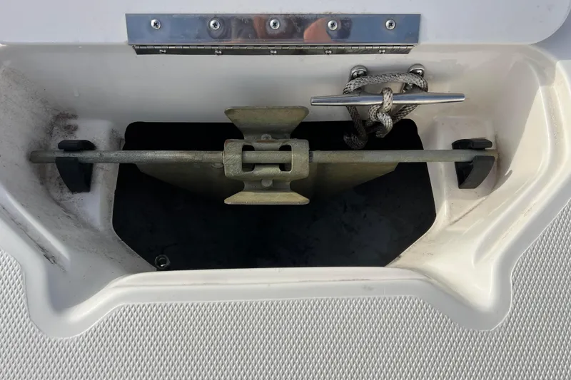 Slide: The Image of Anchor storage compartment on a 2006 Hurricane FunDeck GS 194 OB boat. - 28