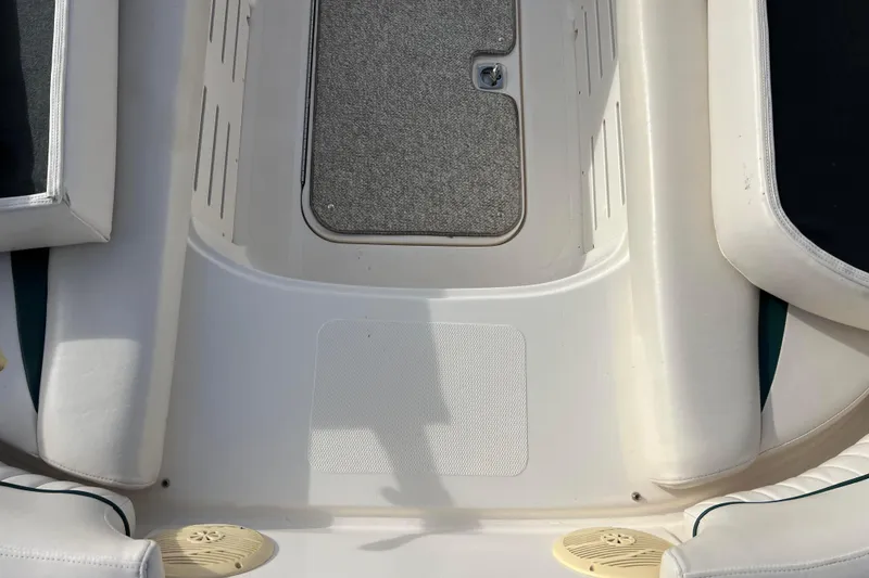 Slide: The Image of 2006 Hurricane FunDeck GS 194 OB boat interior with seating and carpeted floor. - 32