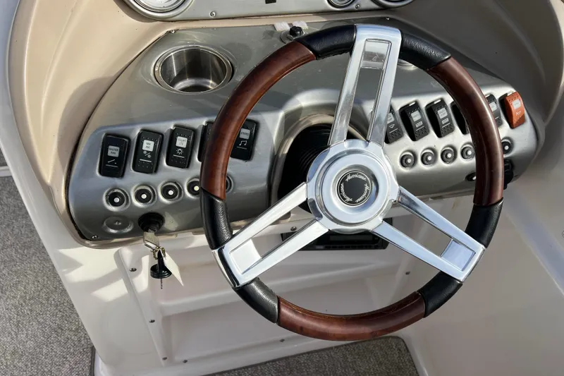 Slide: The Image of Steering wheel and dashboard of 2006 Hurricane FunDeck GS 194 OB boat. - 39