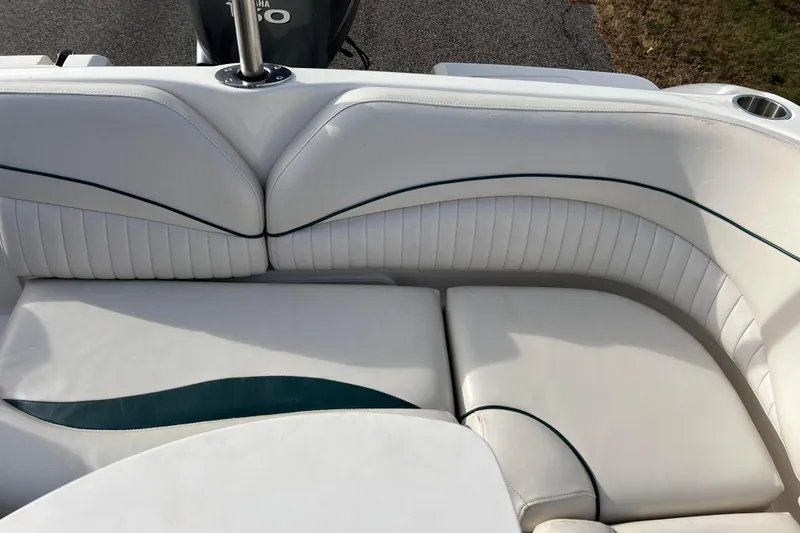 Slide: The Image of 2006 Hurricane FunDeck GS 194 OB boat interior with white cushioned seating. - 40